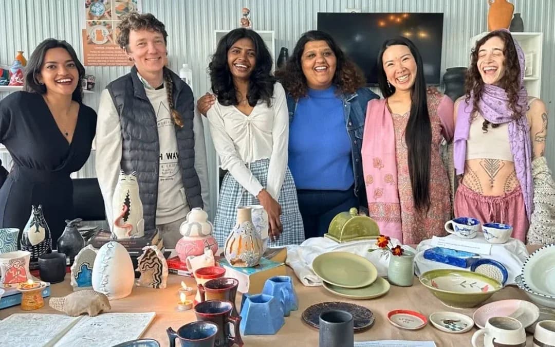 Batch 18 beginners course students gathered in the Dharamkot Studio pottery classroom.