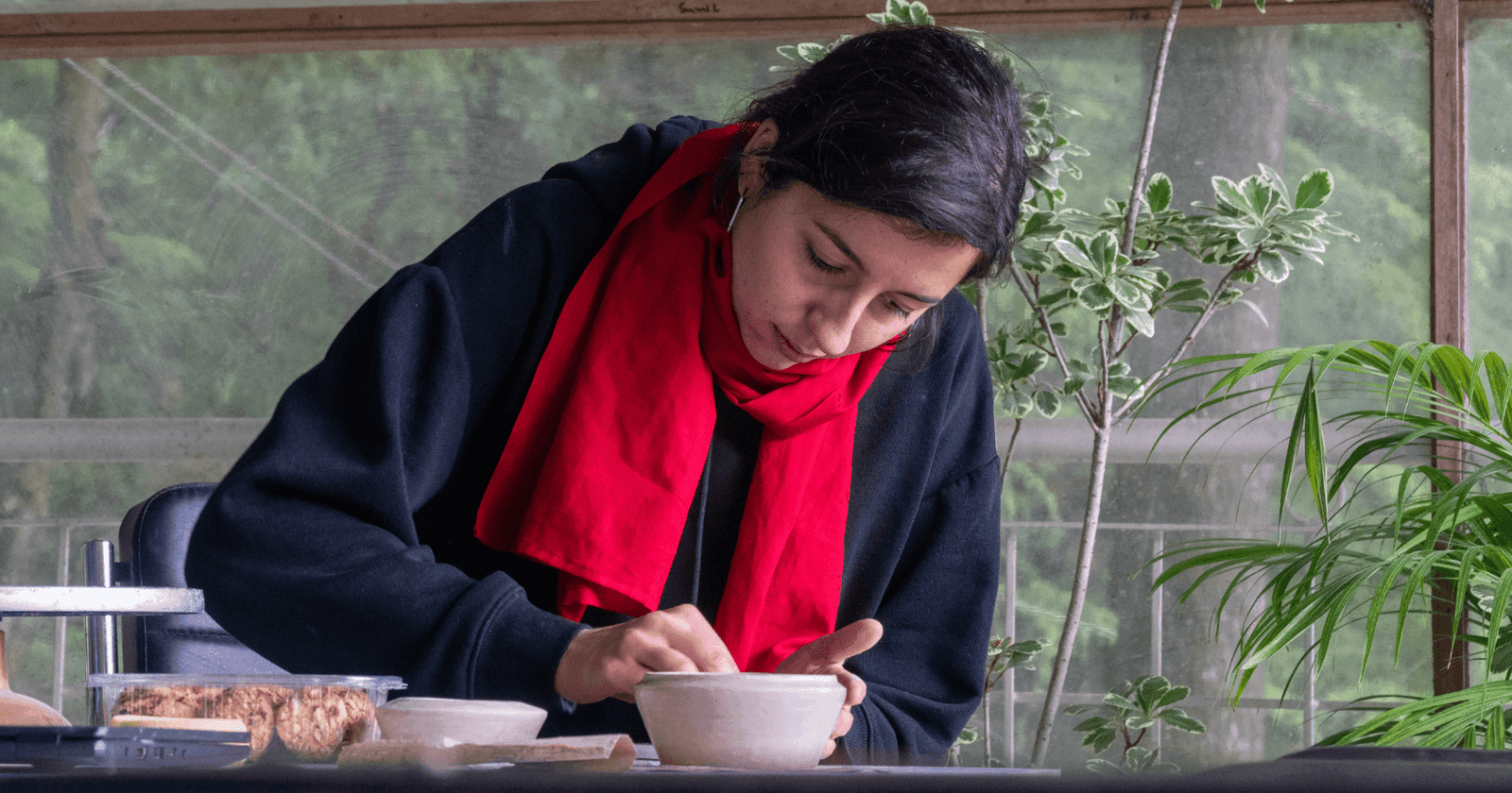 Pottery workshop session with students and instructor at Dharamkot Studio.