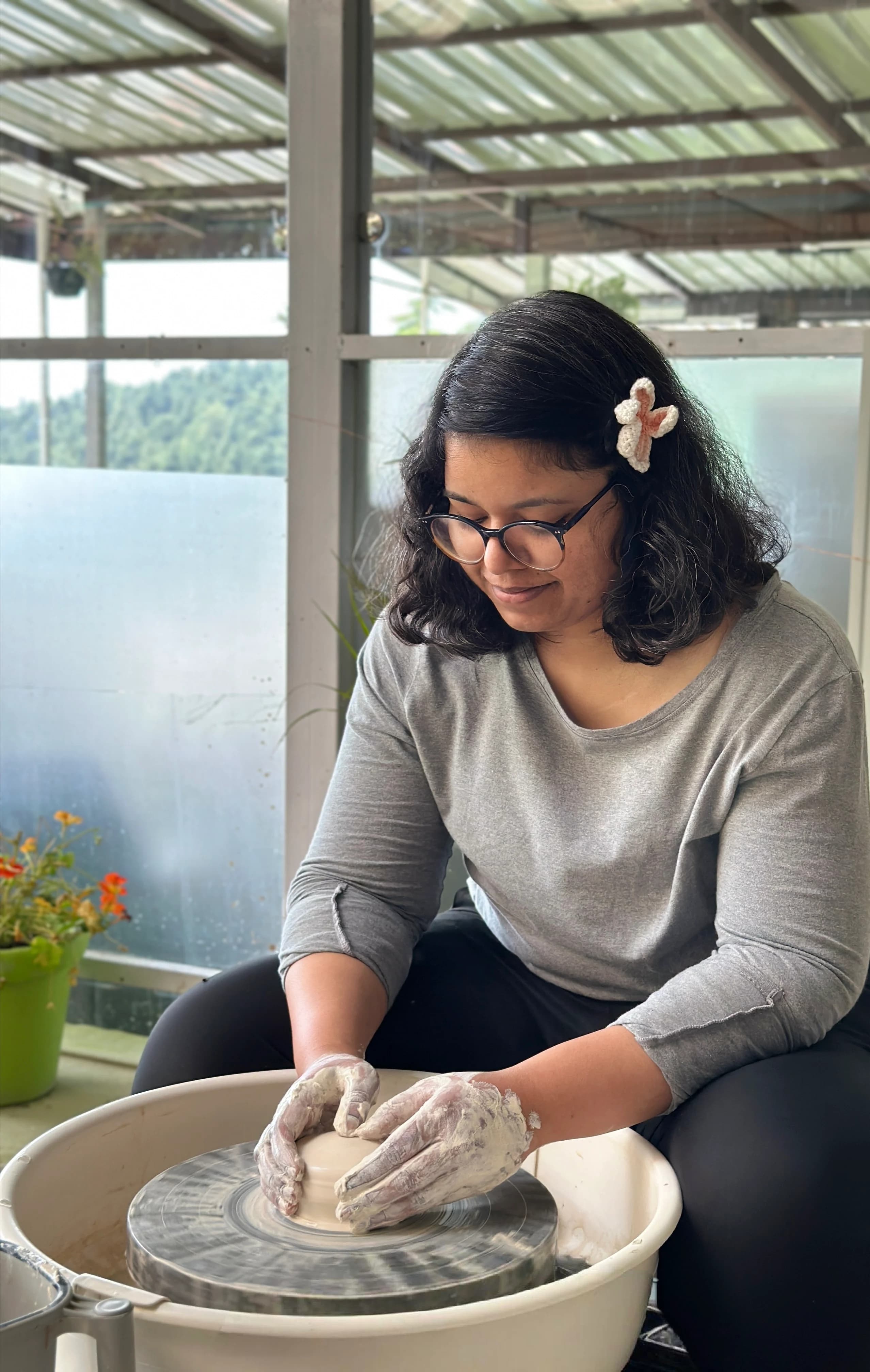 Nishita, educator and ceramicist at Dharamkot Studio.