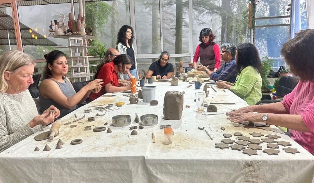 Firing 101 pottery guide with ceramic pieces and kiln firing methods.