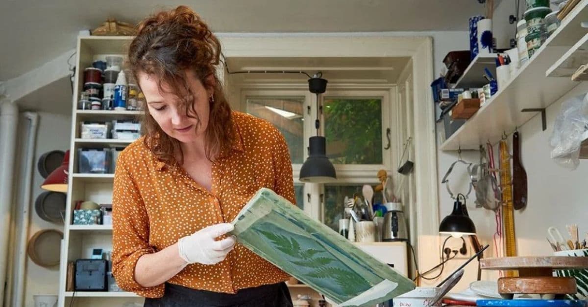 Silkscreen printing on clay process during a ceramic workshop.