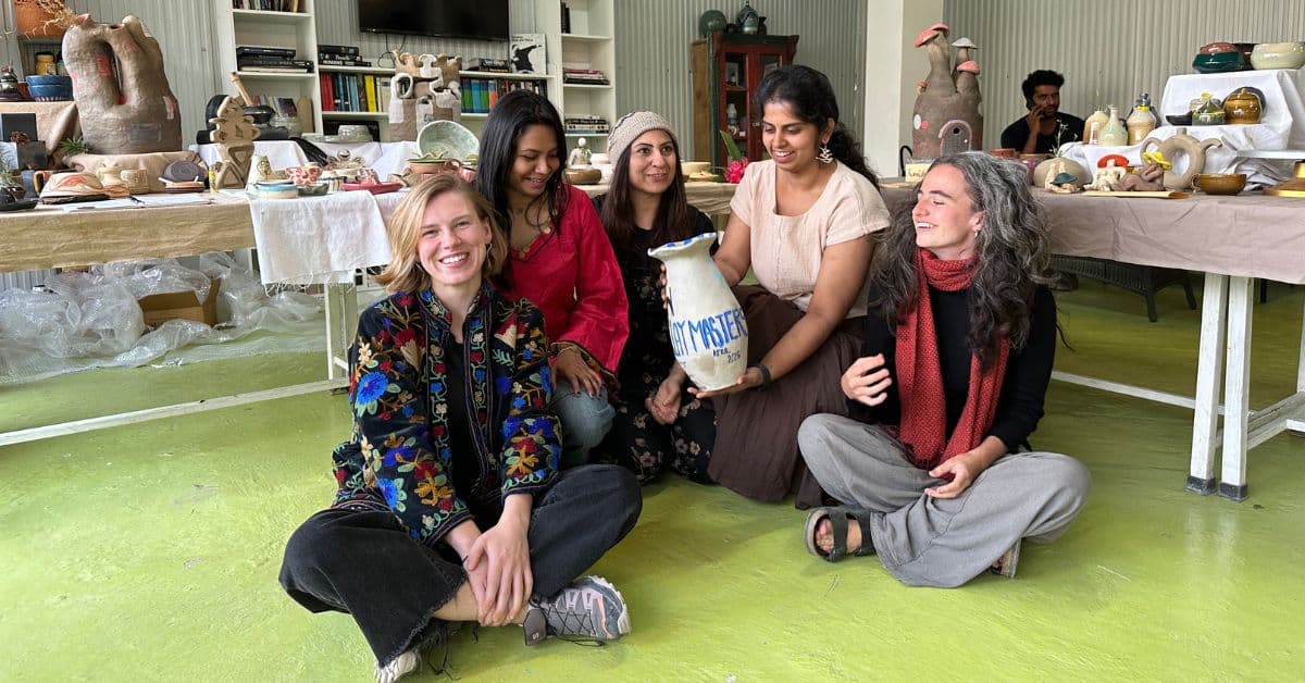 Group photo of 5-week beginner pottery course students.