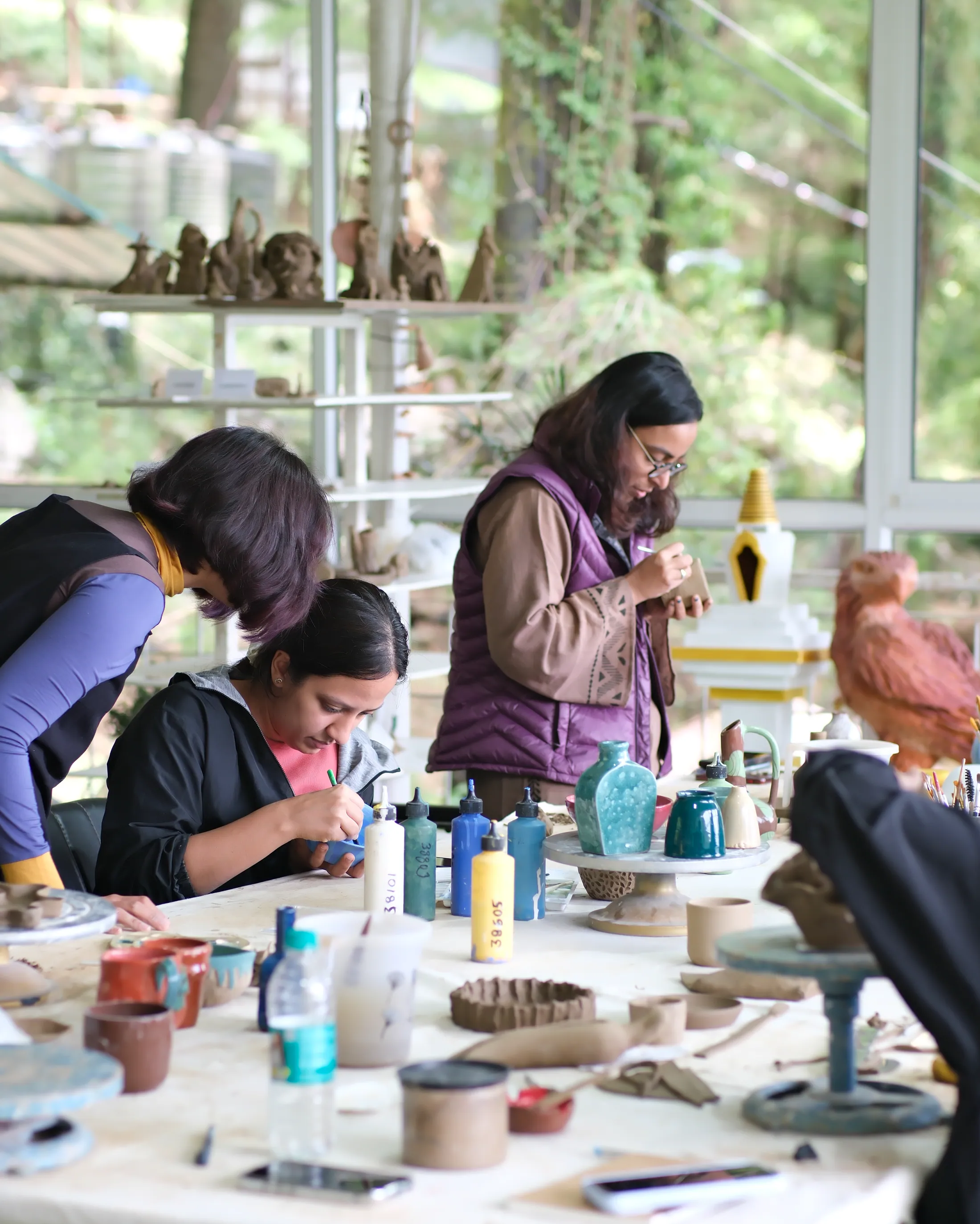 Dharamkot Studio Himachal Pradesh pottery studio with mountain views and clay workspace.
