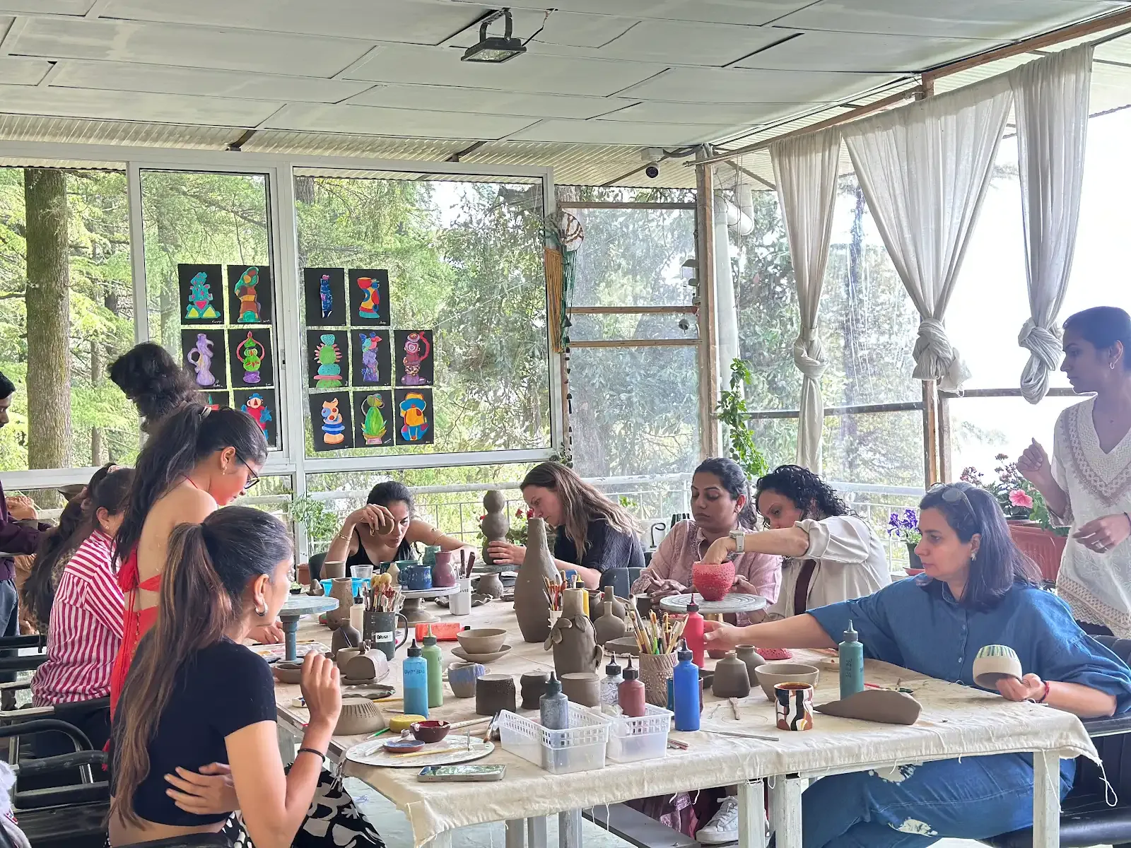Dharamkot Studio retreat centre with pottery practice, forest views, and mountain studio life.