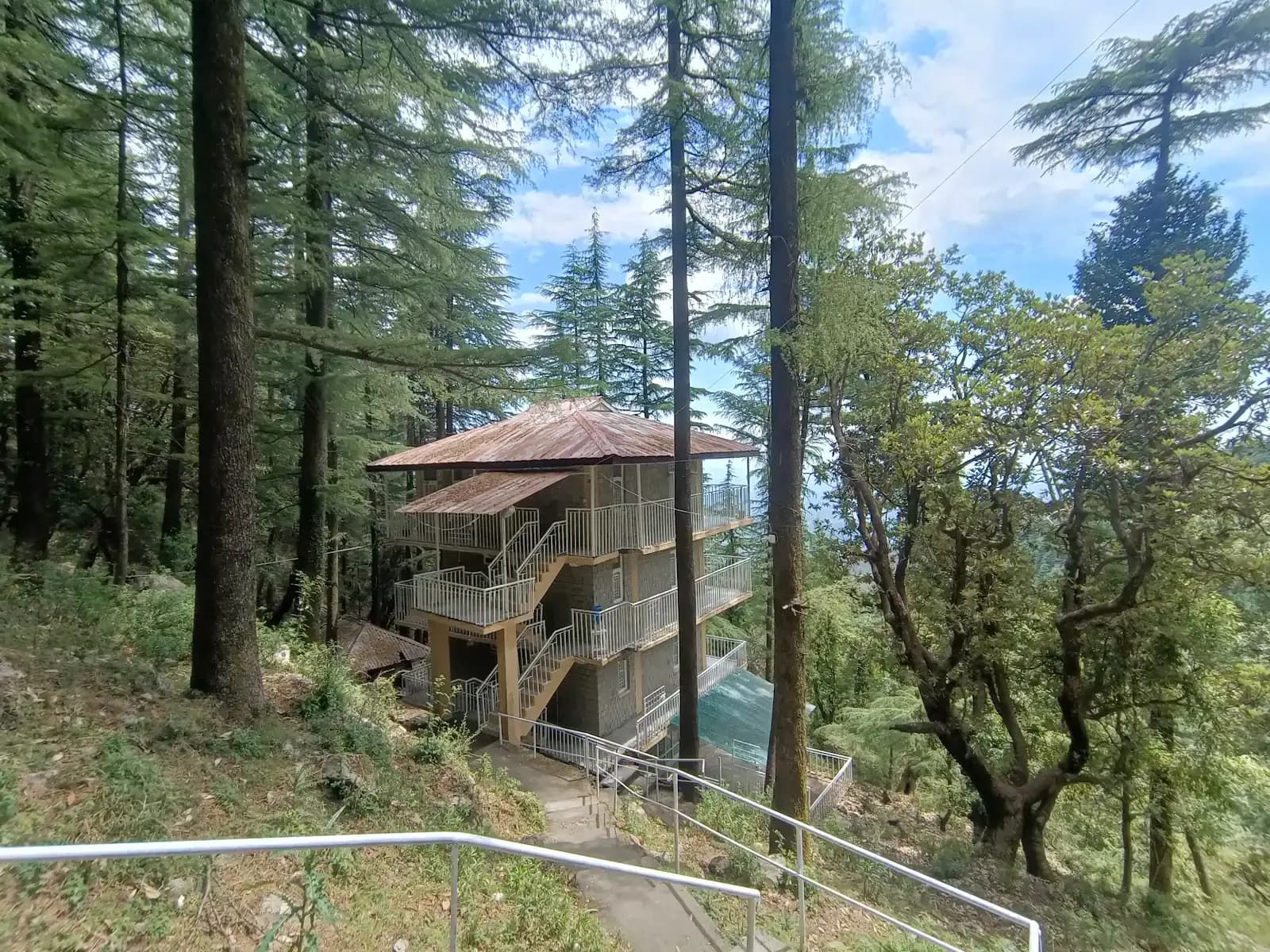 Dharamkot Studio retreat centre with pottery practice, forest views, and mountain studio life.