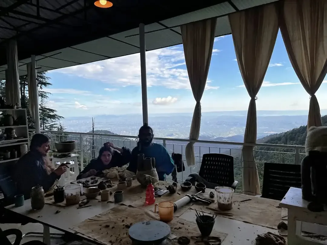 Dharamkot Studio retreat centre with pottery practice, forest views, and mountain studio life.