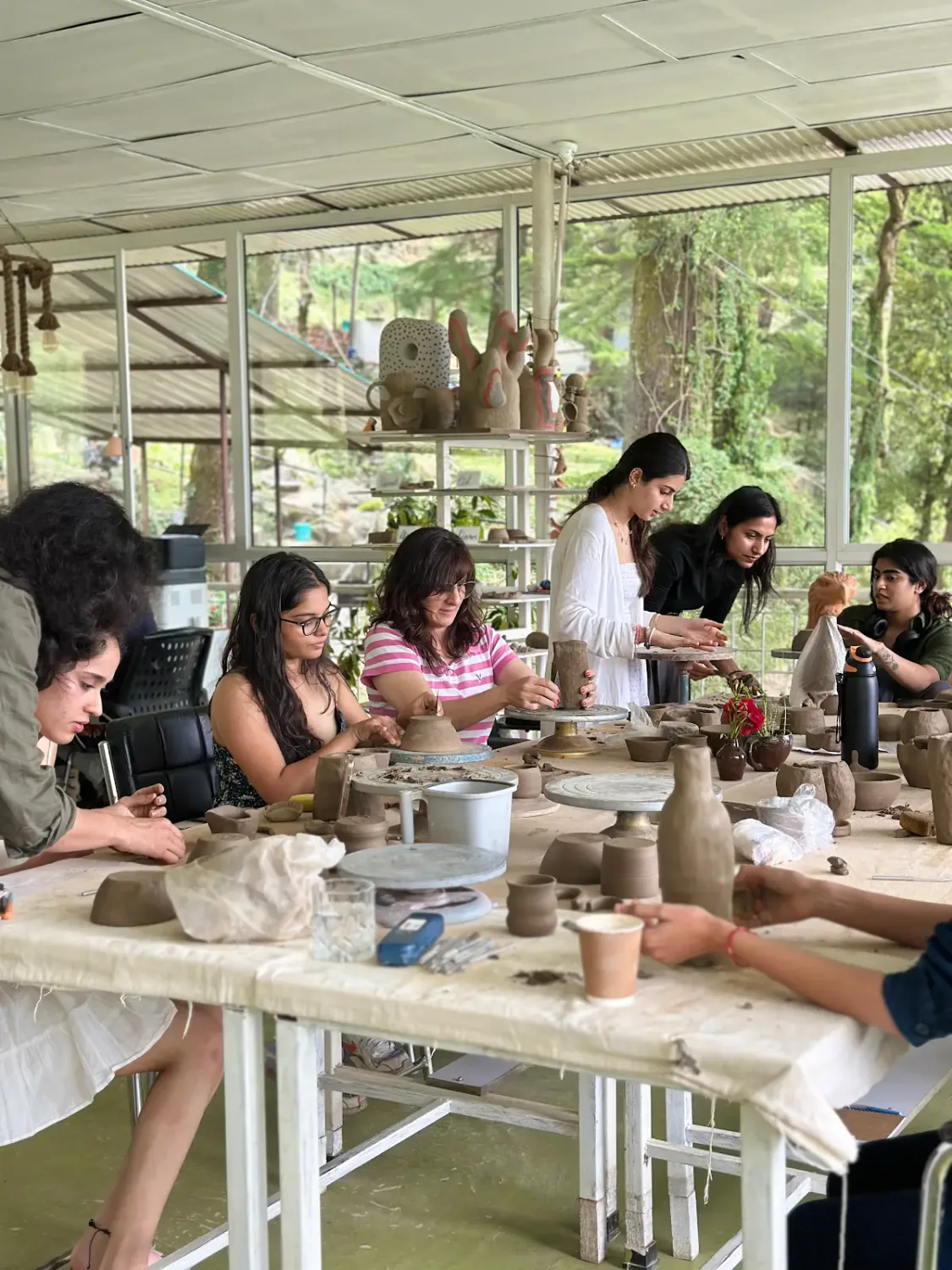 Dharamkot Studio retreat centre with pottery practice, forest views, and mountain studio life.