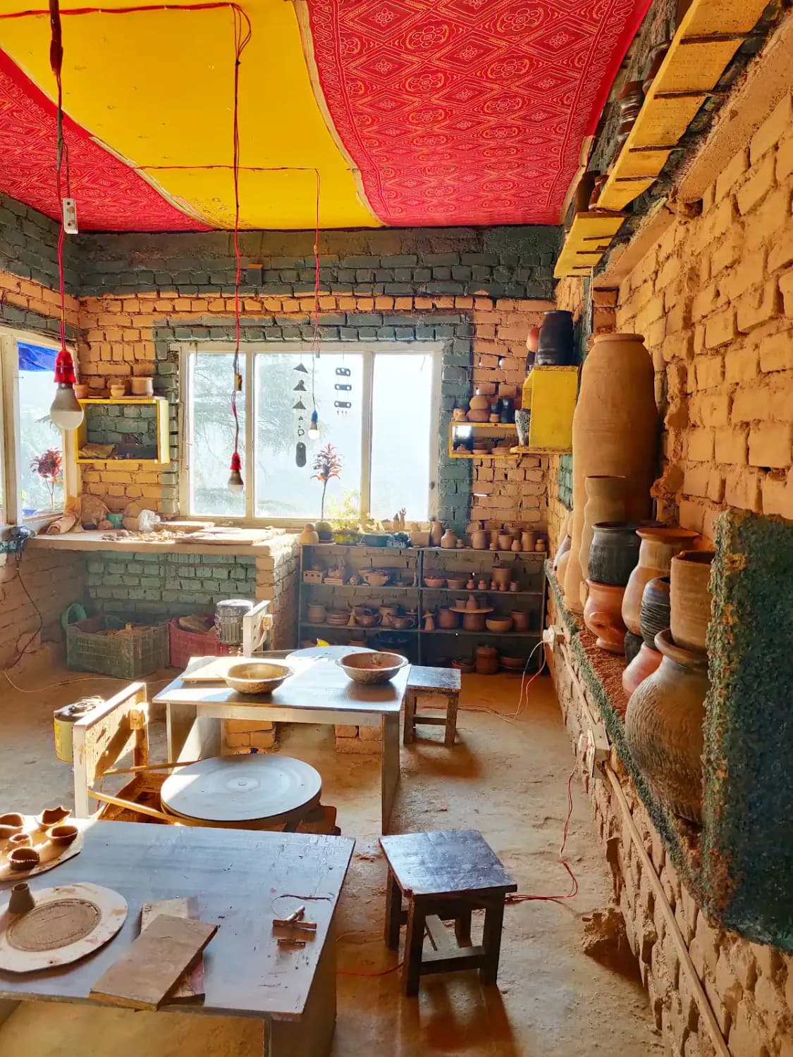 Early days of Dharamkot Studio in the original mountain pottery studio in Himachal Pradesh.