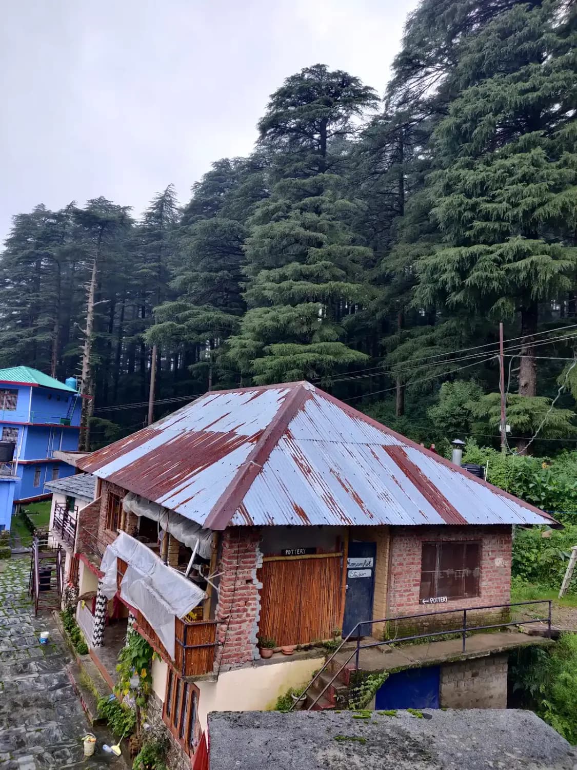 Early days of Dharamkot Studio in the original mountain pottery studio in Himachal Pradesh.