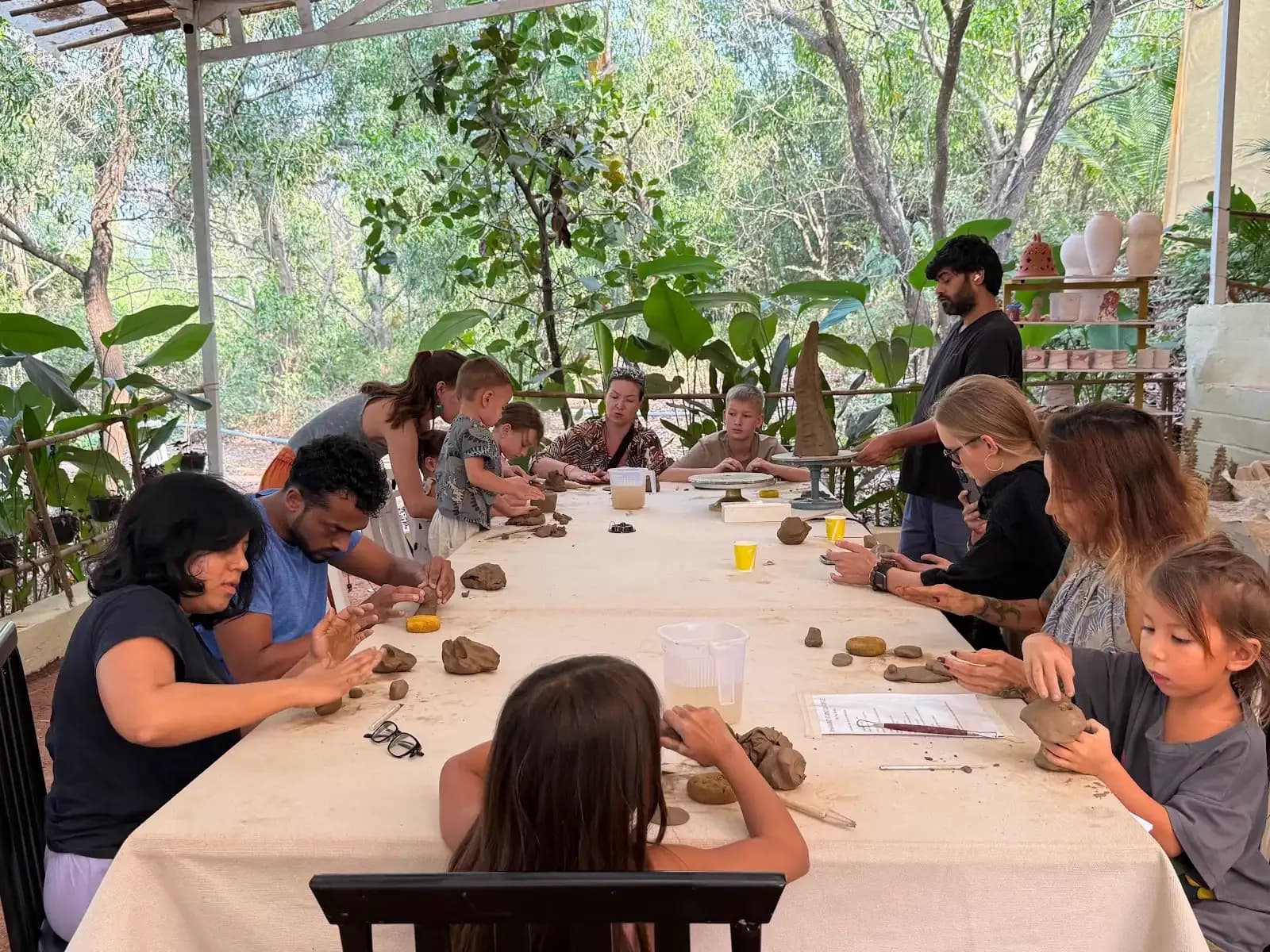 Dharamkot Studio Goa community art space and retreat sessions surrounded by greenery.