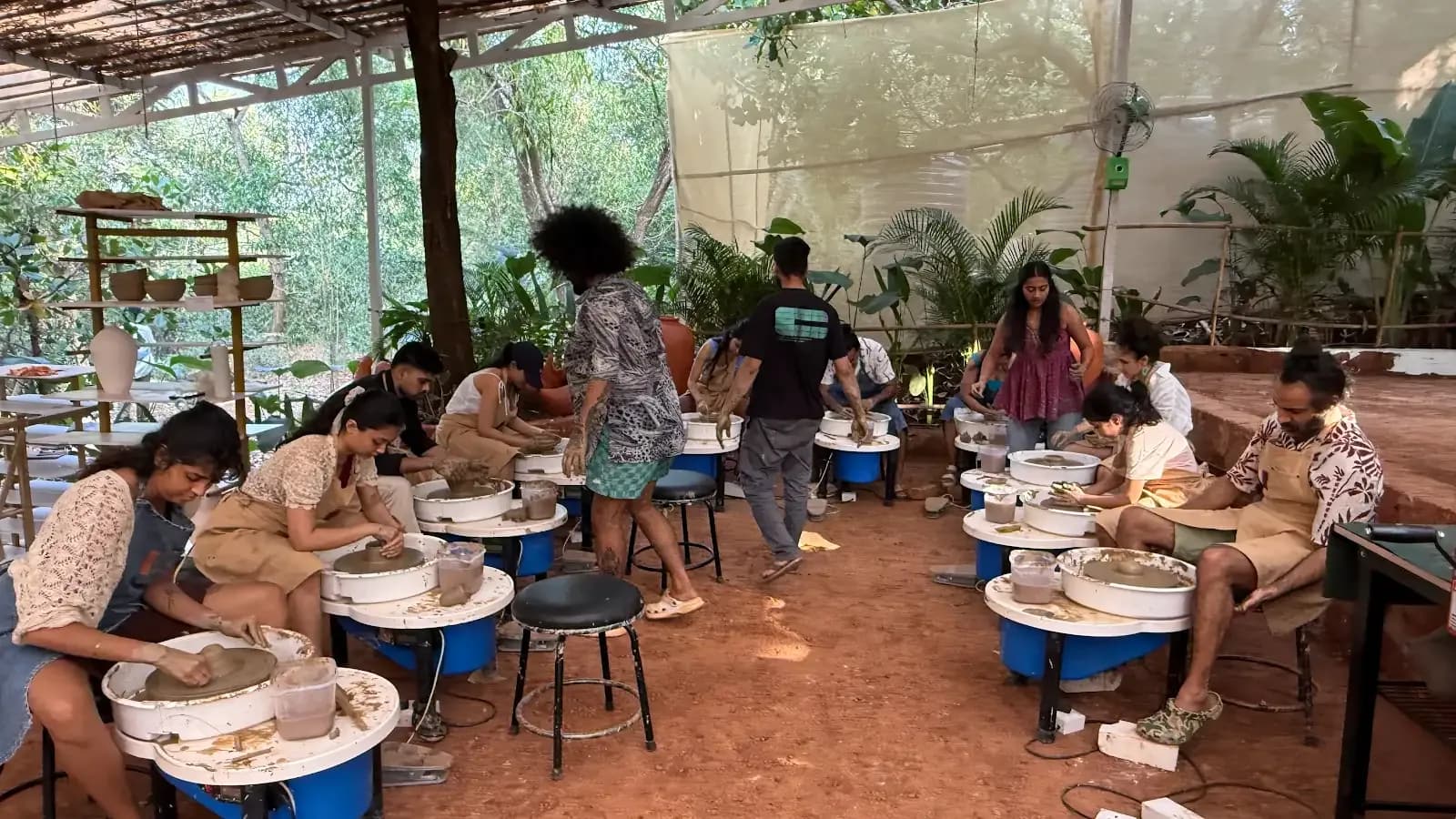 Dharamkot Studio Goa community art space and retreat sessions surrounded by greenery.