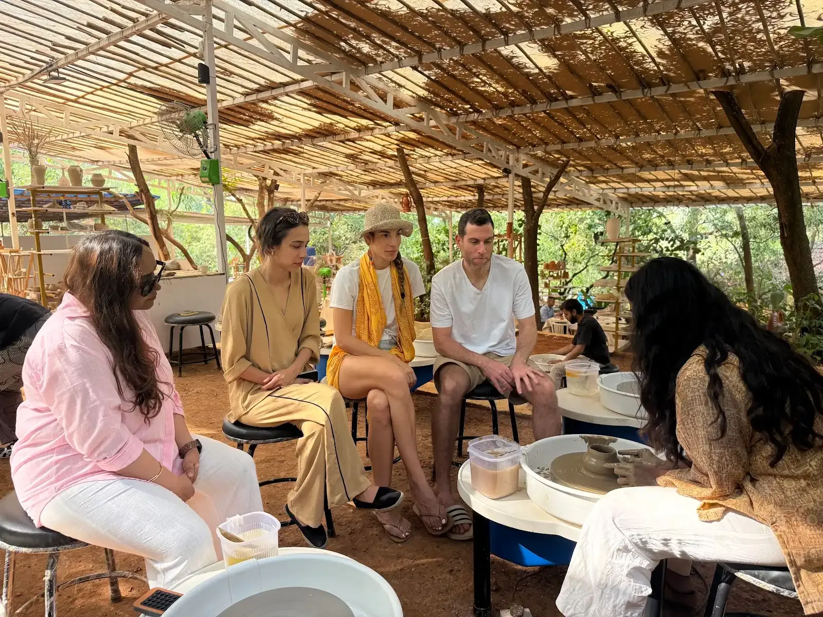 Dharamkot Studio Goa community art space and retreat sessions surrounded by greenery.
