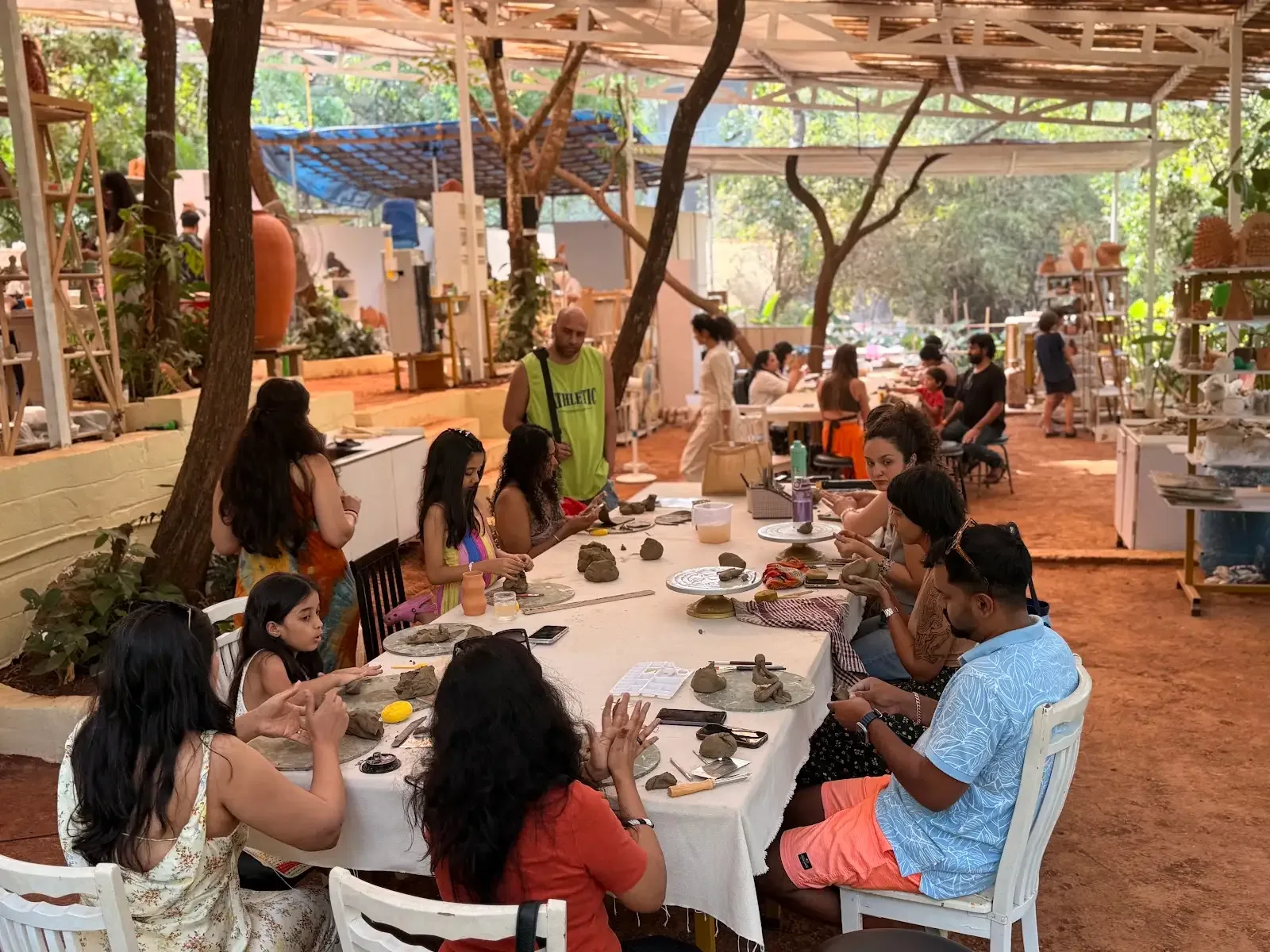 Dharamkot Studio Goa community art space and retreat sessions surrounded by greenery.
