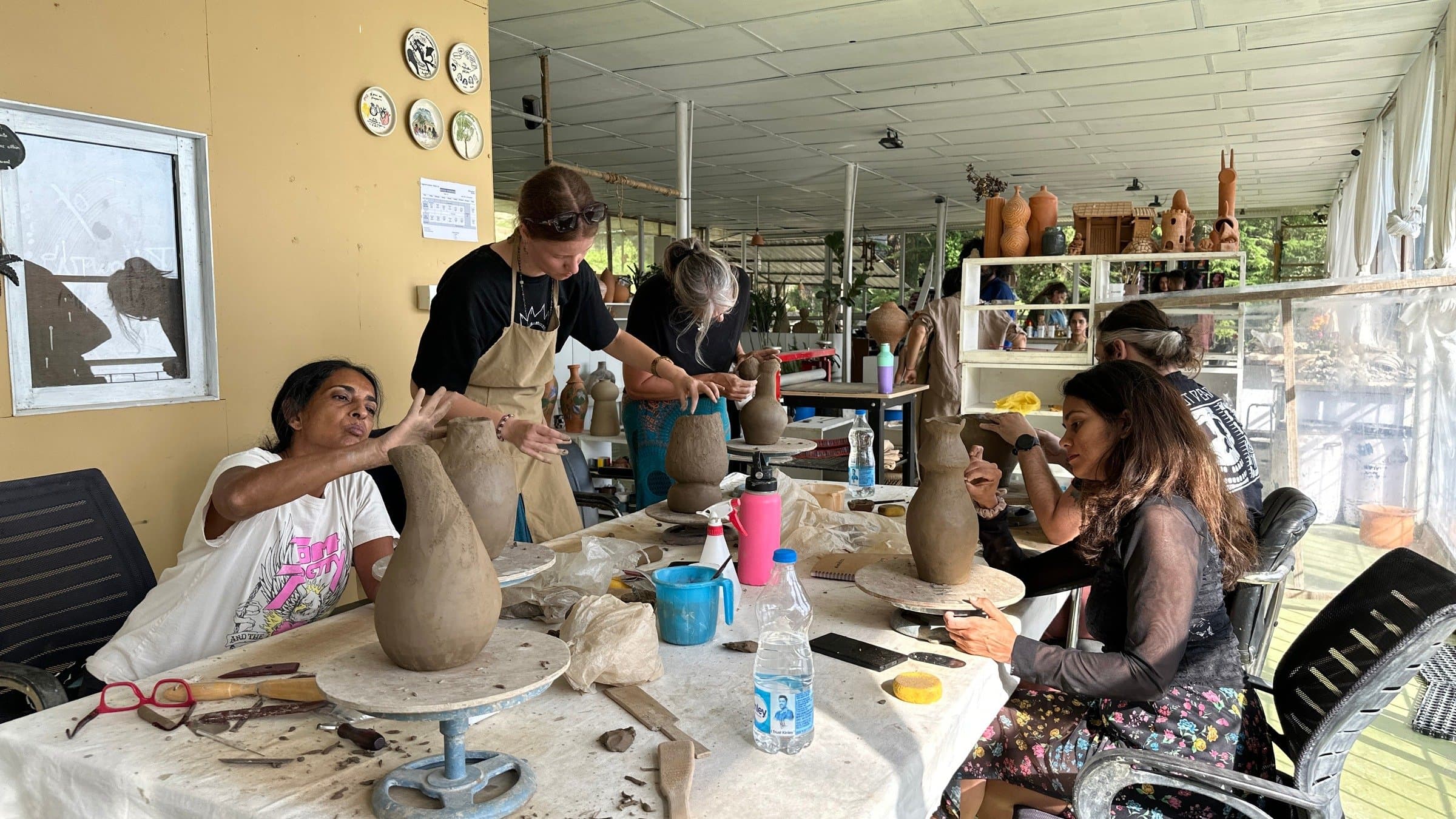 Creative studio atmosphere during a guided making session in the mountains.