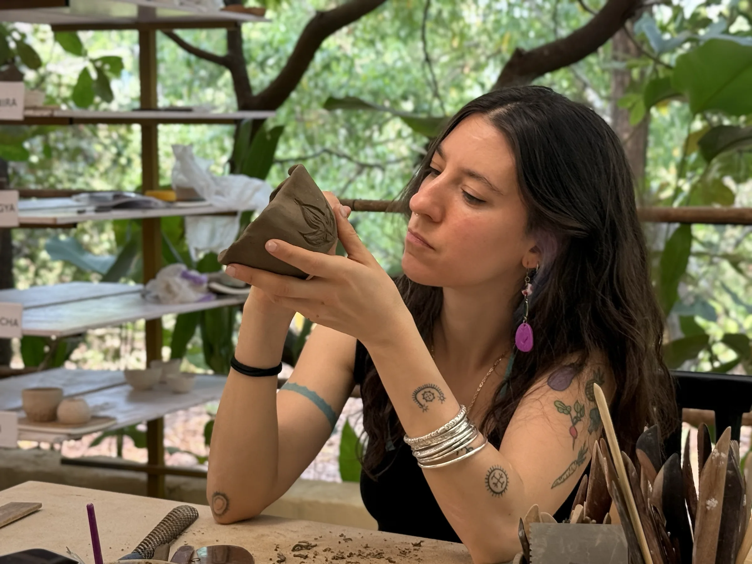 A handmade clay vessel created during the Goa pottery retreat.