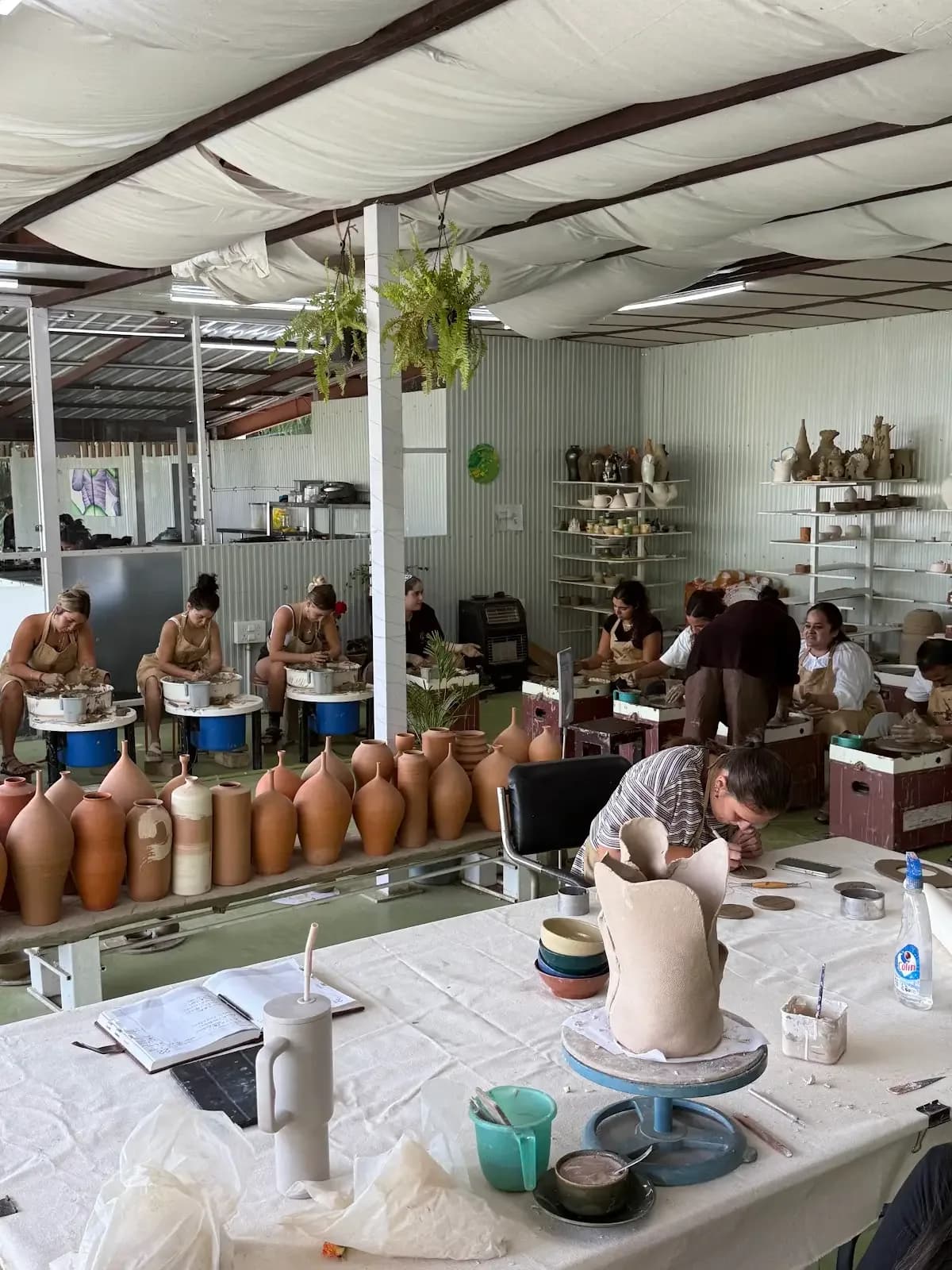 Mountain pottery studio setting for the Himachal pottery wheel experience at Dharamkot Studio.