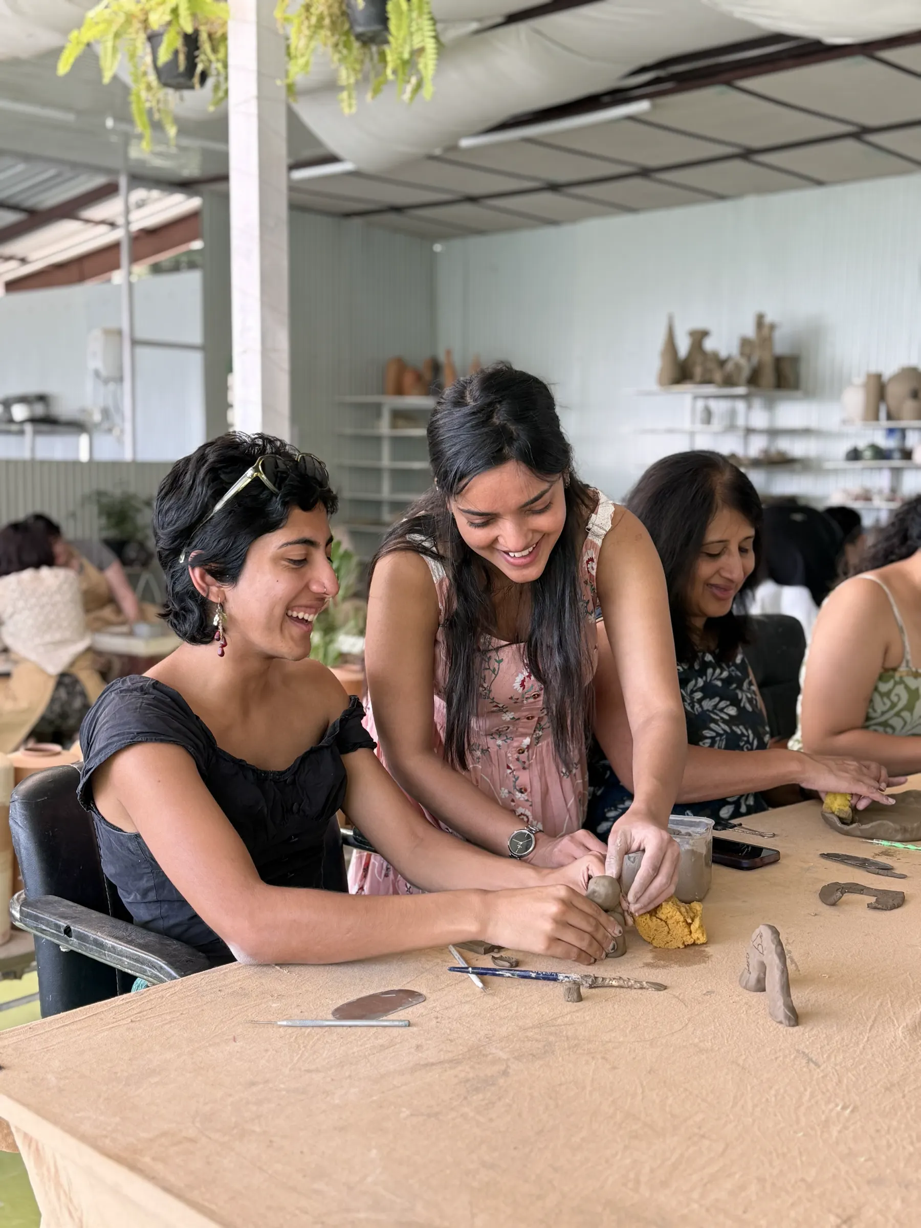 Ceramic artist guiding a handbuilding session during the Dharamkot Studio residency.